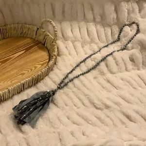 Long necklace with fabric and beaded tassel